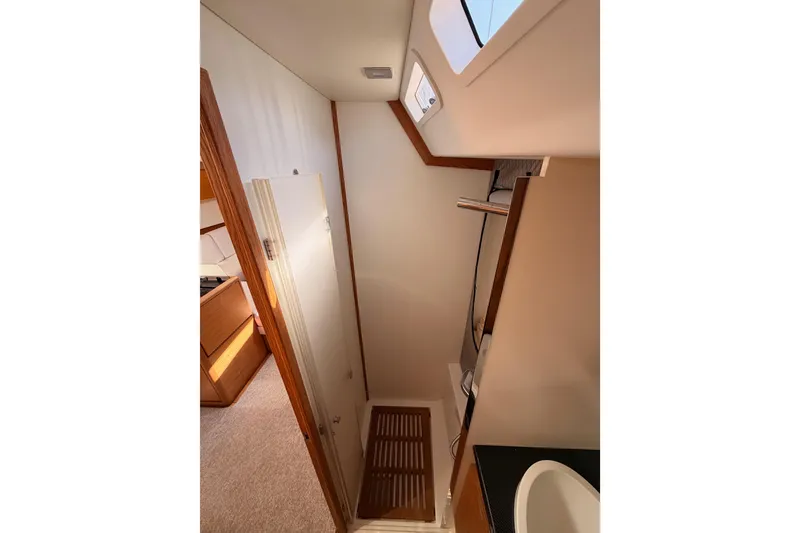 Slide: The Image of Compact bathroom in a 2017 Solaris 50 yacht, featuring a shower and sink. - 81