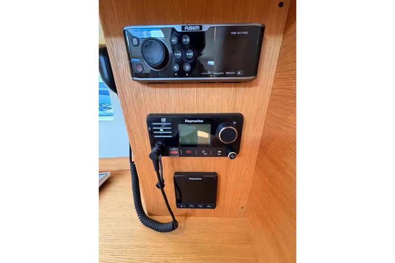 Slide: The Image of Control panel of a 2017 Solaris 50 yacht featuring Fusion and Raymarine systems. - 90