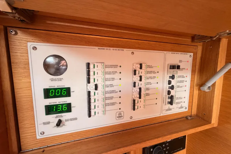Slide: The Image of Control panel of a 2017 Solaris 50 yacht, displaying water level and battery voltage. - 92