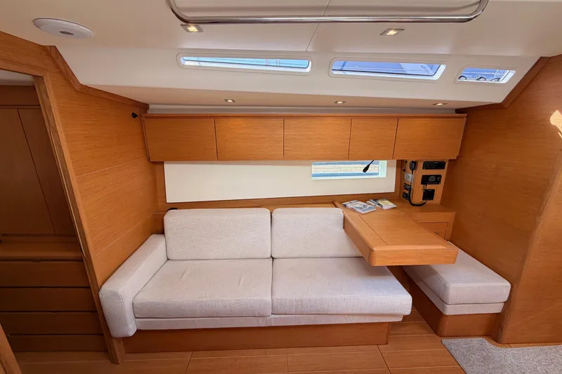 Slide: The Image of Luxurious interior of a 2017 Solaris 50 yacht with modern wood finish and comfortable seating. - 96