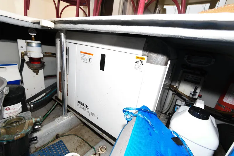 Slide: The Image of Engine room of 2005 Mainship 400 Trawler with Kohler generator. - 24