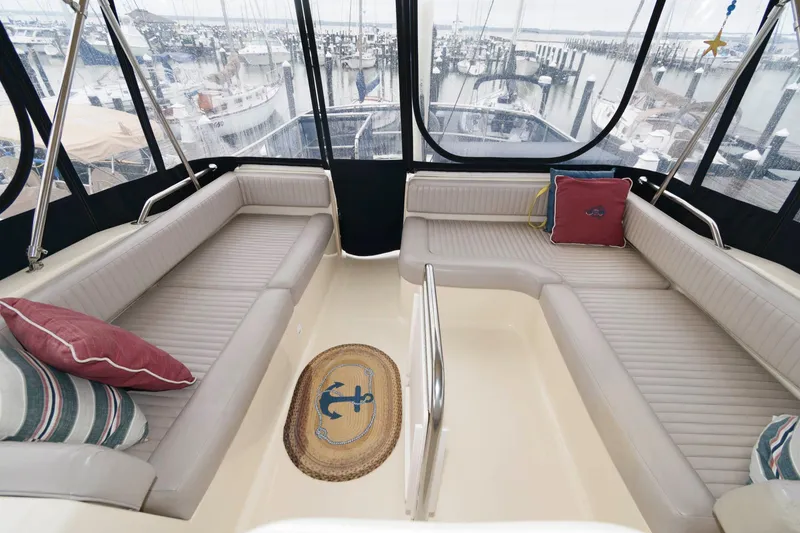 Slide: The Image of Interior of a 2005 Mainship 400 Trawler with comfortable seating. - 5