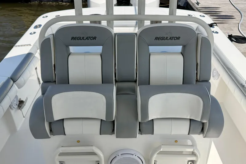 Slide: The Image of 2019 Regulator 31 boat seats, featuring gray and white cushioned design. - 25