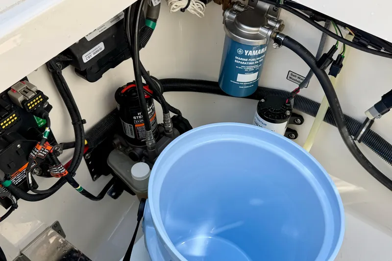 Slide: The Image of 2019 Regulator 31 boat engine compartment with Yamaha marine fuel filter and wiring. - 41