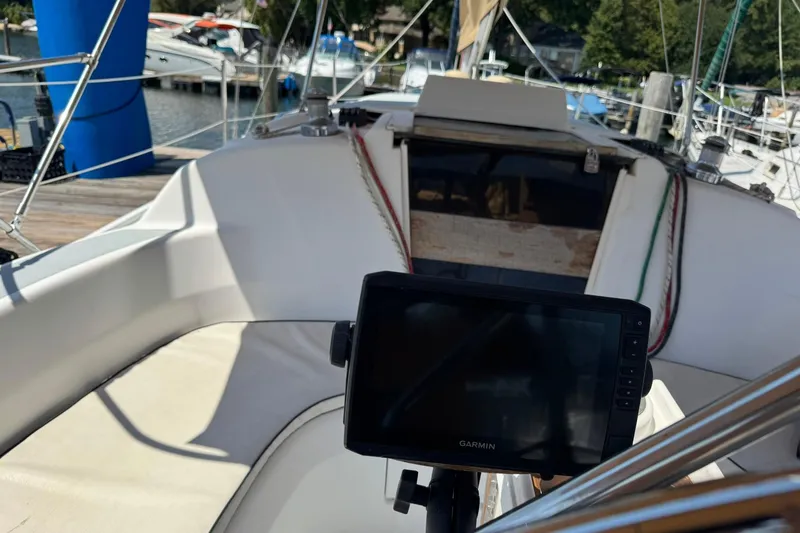 Slide: The Image of Cockpit view of a 1994 Hunter 29.5 sailboat with Garmin navigation system. - 11