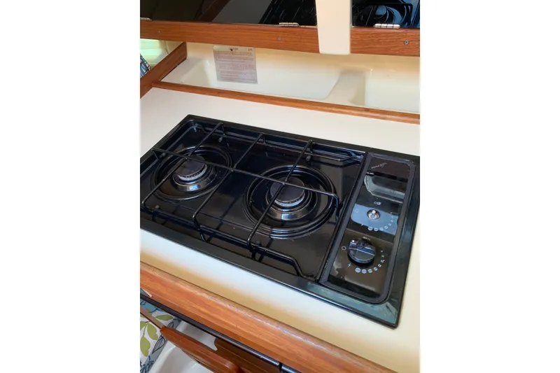 Slide: The Image of Two-burner stove in 1994 Hunter 29.5 sailboat galley kitchen. - 26
