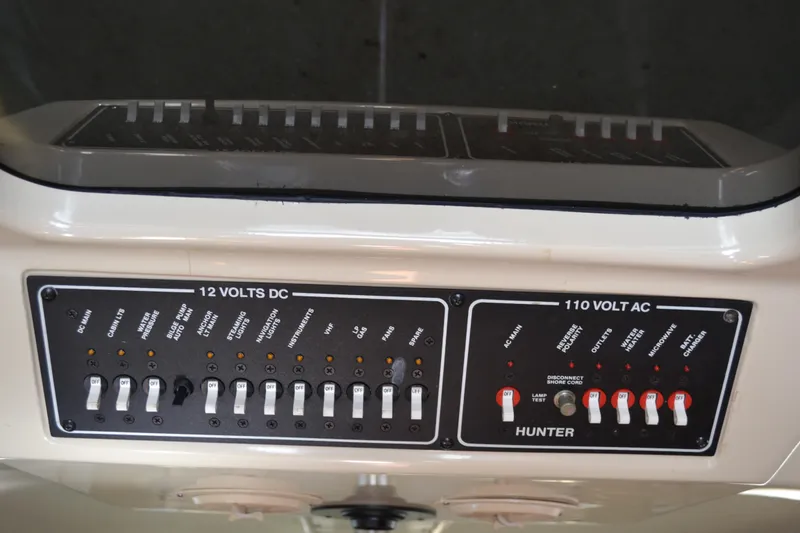 Slide: The Image of Control panel of a 1994 Hunter 29.5 boat. - 33