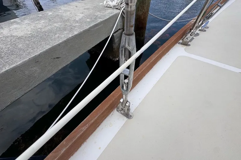 Slide: The Image of Deck view of 1981 Gulfstar 44 Mk II Center Cockpit Sloop, showing rigging and dock. - 25