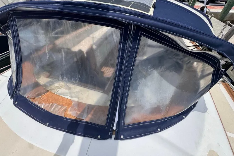 Slide: The Image of 1981 Gulfstar 44 Mk II Center Cockpit Sloop with blue canvas cockpit enclosure. - 41