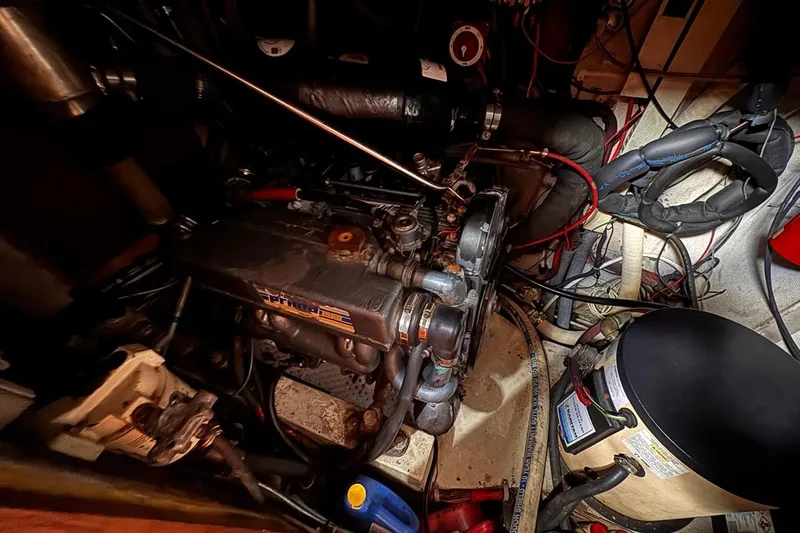 Slide: The Image of Engine compartment of a 1981 Gulfstar 44 Mk II Center Cockpit Sloop, showcasing mechanical components. - 69