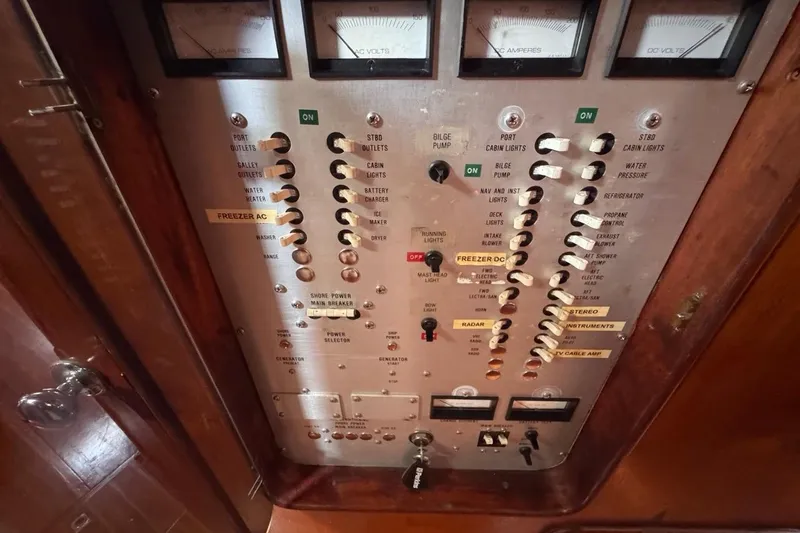 Slide: The Image of Electrical control panel of a 1981 Gulfstar 44 Mk II Center Cockpit Sloop yacht. - 70