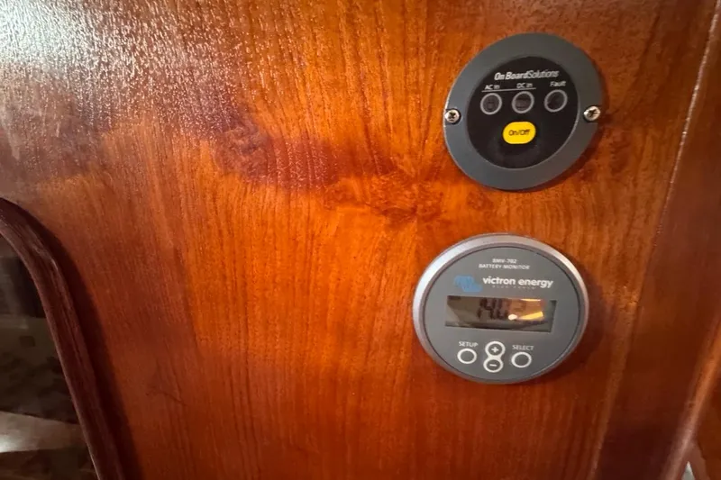 Slide: The Image of Control panel on 1981 Gulfstar 44 Mk II Center Cockpit Sloop with Victron Energy monitor. - 71