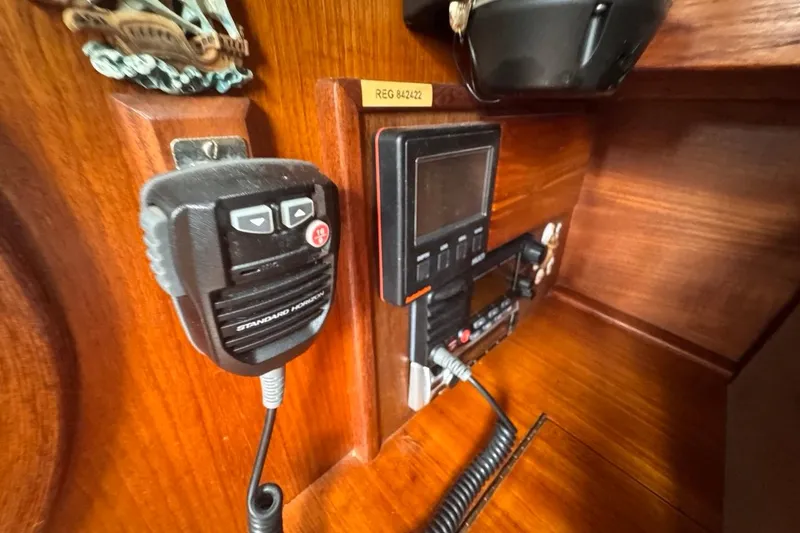 Slide: The Image of Radio equipment on 1981 Gulfstar 44 Mk II Center Cockpit Sloop's wooden interior. - 73