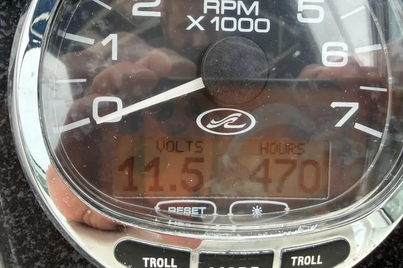 Slide: The Image of Close-up of Sea Ray 270 Amberjack 2008 tachometer showing 11.5 volts and 470 hours. - 20