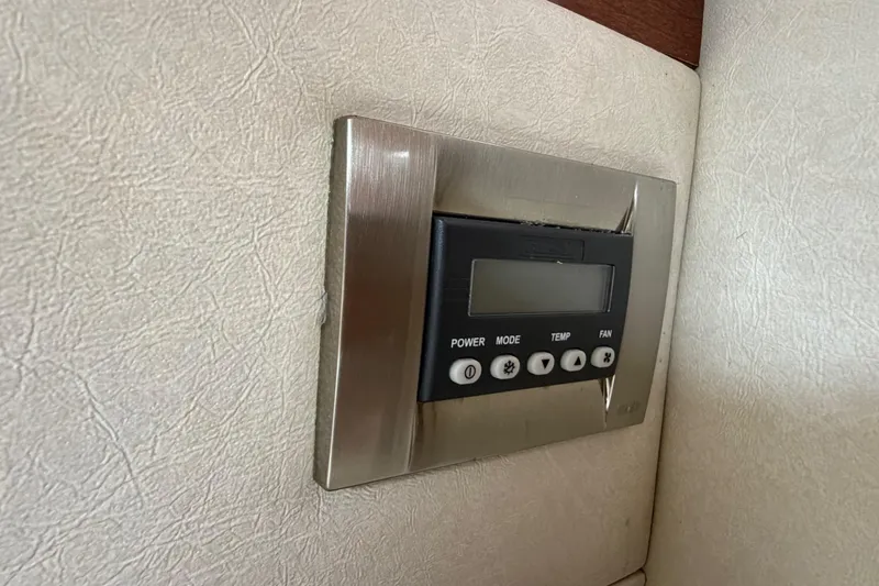 Slide: The Image of Control panel on 2008 Sea Ray 270 Amberjack boat interior wall. - 21