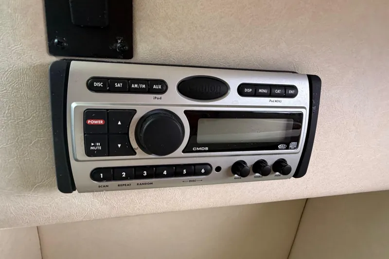 Slide: The Image of Clarion CMD5 stereo system in a 2008 Sea Ray 270 Amberjack boat interior. - 24