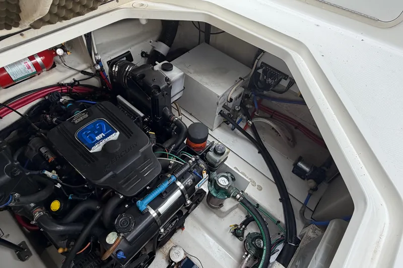 Slide: The Image of Engine compartment of a 2008 Sea Ray 270 Amberjack with Mercury 6.2 MPI engine. - 27