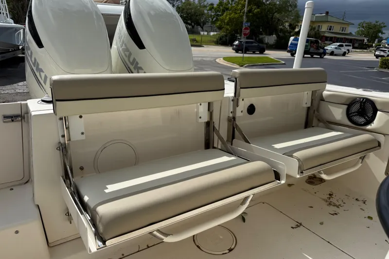 Slide: The Image of 2020 Sea Chaser 27 HFC CC boat with dual Suzuki engines and foldable seating. - 17