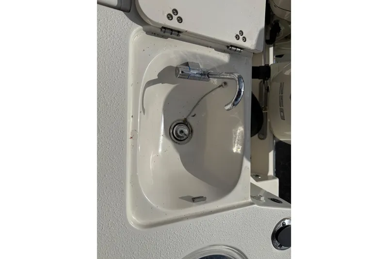 Slide: The Image of Sink and faucet on 2020 Sea Chaser 27 HFC CC boat. - 18