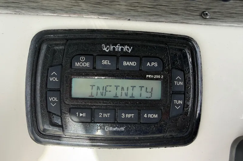 Slide: The Image of Infinity stereo system on 2020 Sea Chaser 27 HFC CC boat dashboard. - 29