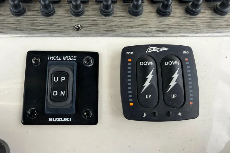 Slide: The Image of Control panel of a 2020 Sea Chaser 27 HFC CC boat with Suzuki troll mode. - 30