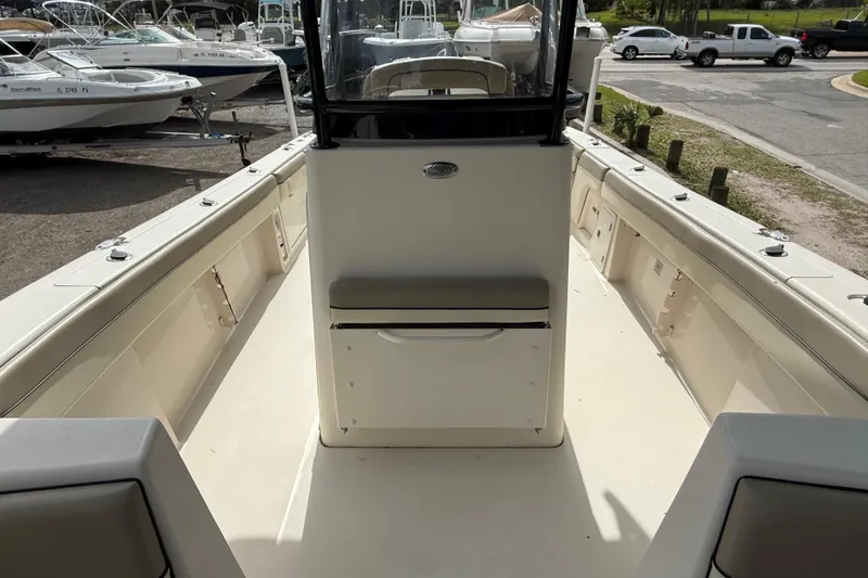 Slide: The Image of 2020 Sea Chaser 27 HFC CC boat interior, showcasing spacious deck and seating area. - 38
