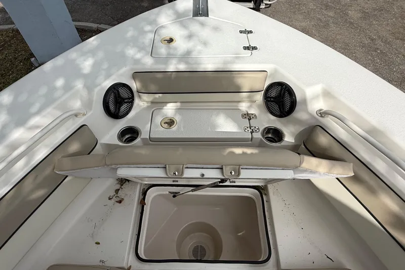 Slide: The Image of 2020 Sea Chaser 27 HFC CC boat interior with storage compartment and seating. - 41