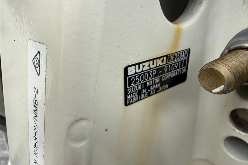Slide: The Image of Suzuki motor label on a 2020 Sea Chaser 27 HFC CC boat engine. - 49
