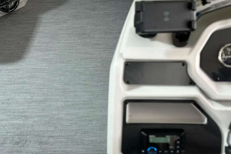 Slide: The Image of Control panel of 2026 Sweetwater EX2086SFLX boat with modern design elements. - 10