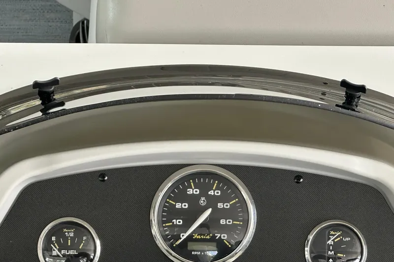 Slide: The Image of Dashboard of 2026 Sweetwater EX2086SFLX boat with speedometer and fuel gauge. - 11