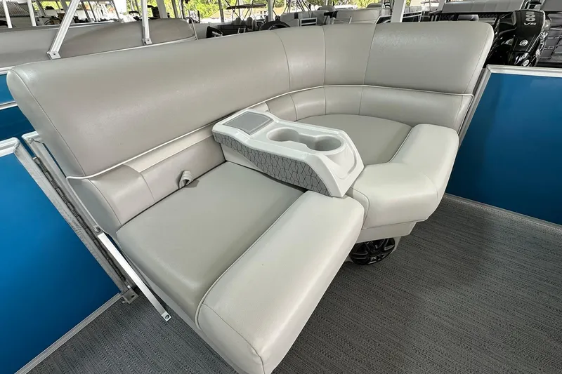 Slide: The Image of Luxurious seating on 2026 Sweetwater EX2086SFLX pontoon boat with cup holders. - 5