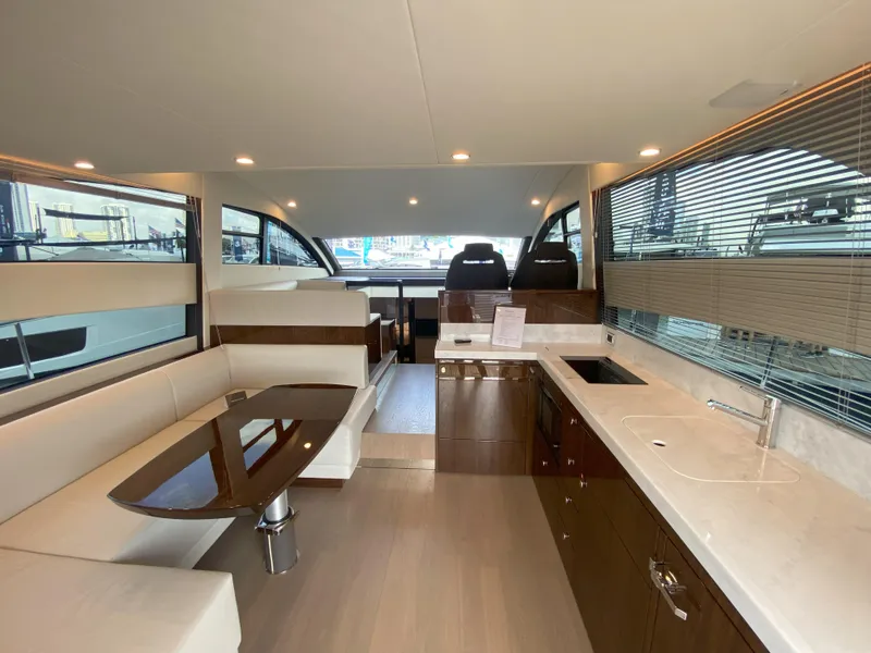 Slide: The Image of Interior of 2024 Fairline Squadron 50 yacht with modern furnishings. - 11