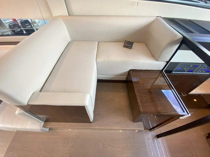 Slide: The Image of Interior of 2024 Fairline Squadron 50 yacht with elegant seating area. - 14