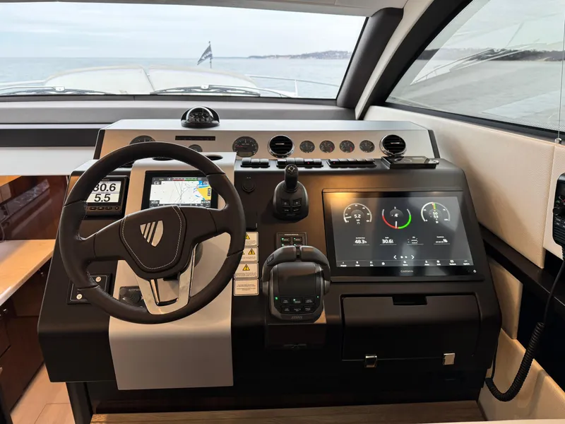 Slide: The Image of Cockpit of 2024 Fairline Squadron 50 yacht with modern navigation systems. - 15