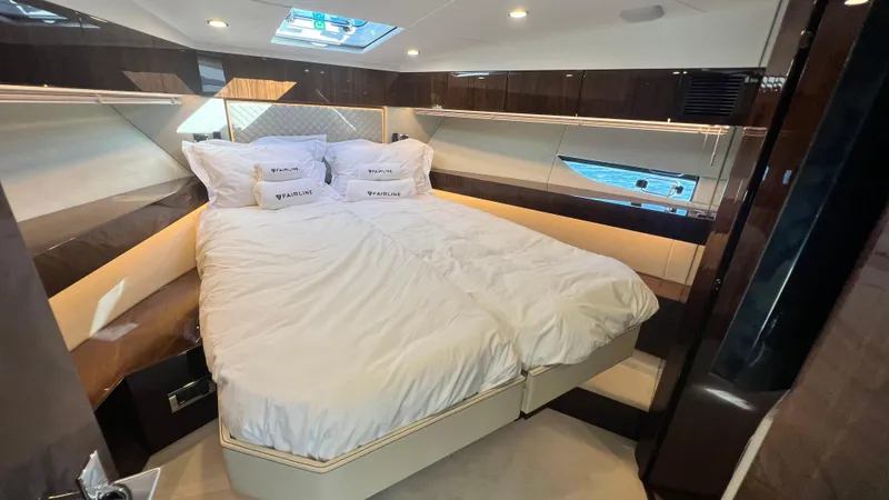 Slide: The Image of Luxurious bedroom on the 2024 Fairline Squadron 50 yacht. - 16