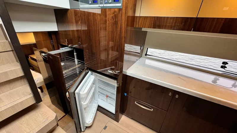 Slide: The Image of Interior of 2024 Fairline Squadron 50 yacht with modern kitchen. - 19