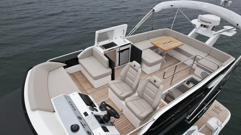 Slide: The Image of 2024 Fairline Squadron 50 luxury yacht with spacious deck and modern seating. - 25