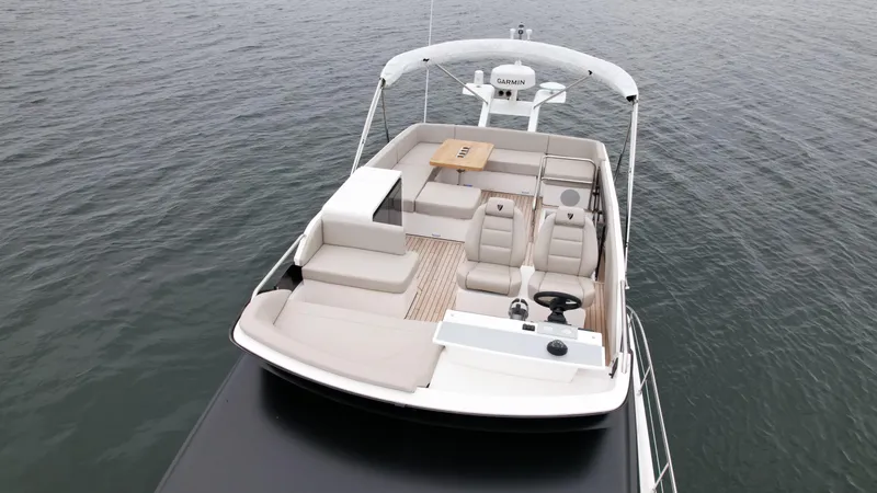 Slide: The Image of Fairline Squadron 50 2024 yacht flybridge with seating and helm station. - 26