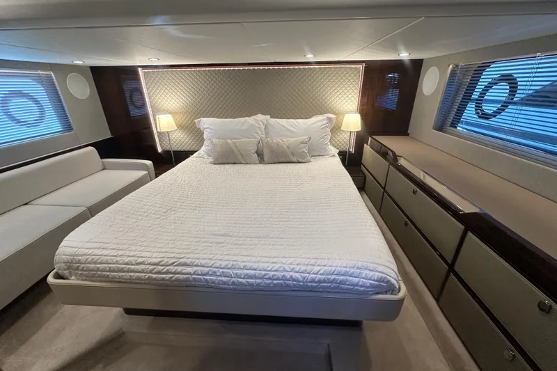 Slide: The Image of Luxurious bedroom interior of 2024 Fairline Squadron 50 yacht with elegant furnishings. - 42