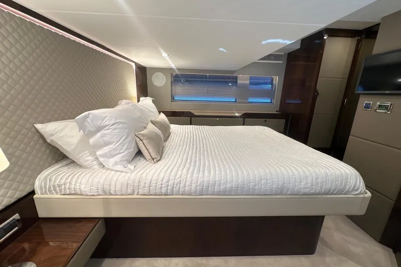 Slide: The Image of Luxurious bedroom interior of 2024 Fairline Squadron 50 yacht with elegant bedding. - 46