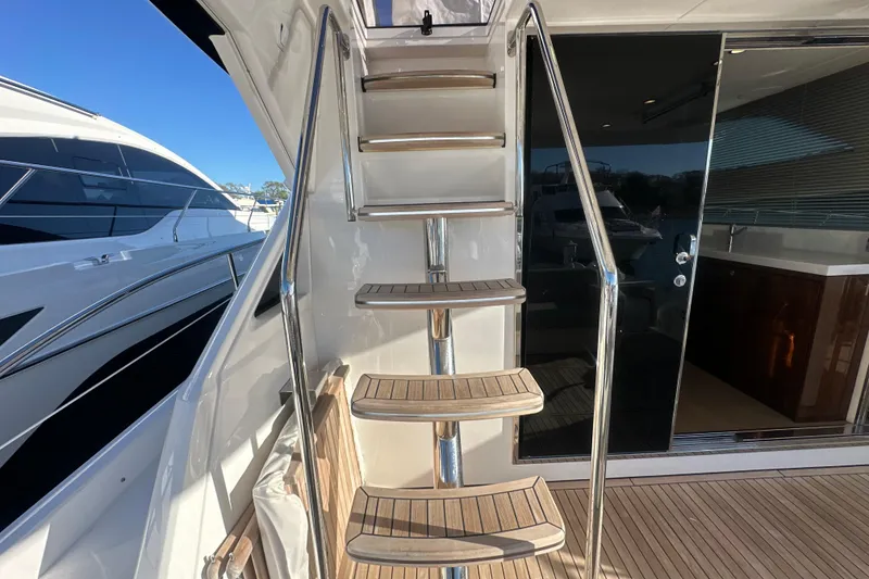 Slide: The Image of Staircase on 2024 Fairline Squadron 50 yacht, leading to upper deck. - 58