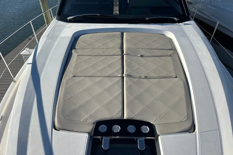 Slide: The Image of 2024 Fairline Squadron 50 yacht with luxurious sunbathing cushions on deck. - 69