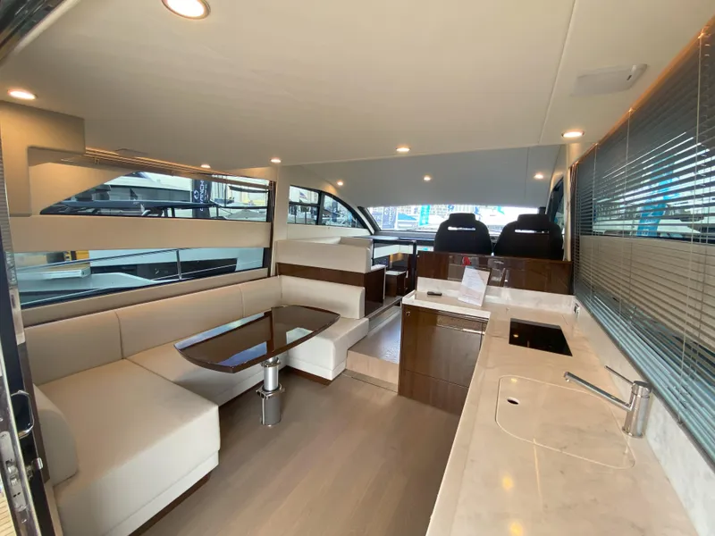 Slide: The Image of Interior of 2024 Fairline Squadron 50 yacht with modern furnishings. - 9