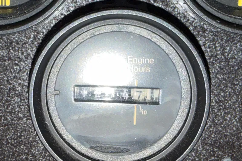 Slide: The Image of Close-up of 1986 Sea Ray 340 Sundancer engine hour meter displaying 471 hours. - 14