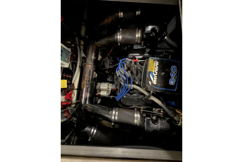 Slide: The Image of Engine compartment of a 1986 Sea Ray 340 Sundancer with MerCruiser components. - 23