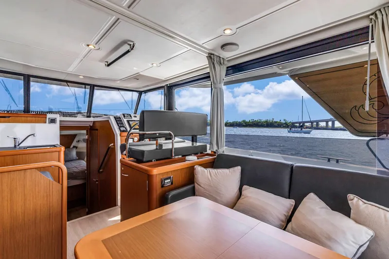 Slide: The Image of Interior of 2019 Beneteau Swift Trawler 35 with scenic water view. - 15