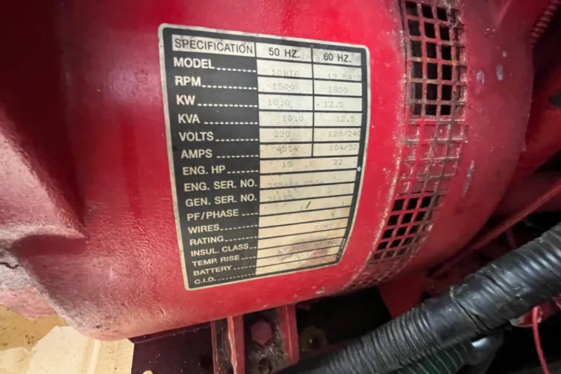 Slide: The Image of Red WaveLenth Wide Body generator with specification label, 1995 model. - 47