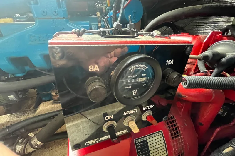 Slide: The Image of Control panel of a 1995 WaveLenth Wide Body generator with elapsed time display. - 48