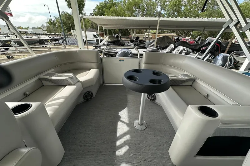 Slide: The Image of Interior of 2026 Sweetwater EX2086S pontoon boat with seating and table. - 20