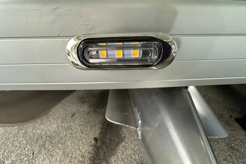 Slide: The Image of Close-up of Sweetwater EX2086S 2026 boat light and metallic surface. - 4